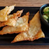 Sweet Potato Wonton (4 Pc) · Deep-fried wonton filled with mashed sweet potato and cilantro. Served with cucumber relish.