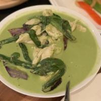 Green Curry · With eggplants, green beans, bell peppers, and basil, coconut milk.