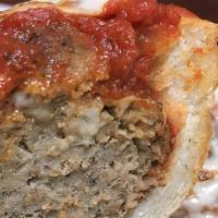 Meatball · House Red Sauce and Beef & Pork Meatballs topped with Mozzarella and Parmesan then Broiled