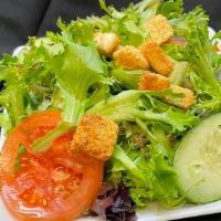 Side Salad · A mound of arcadian harvest mixed greens, cucumbers, sliced tomatoes, homestyle garlic crout...