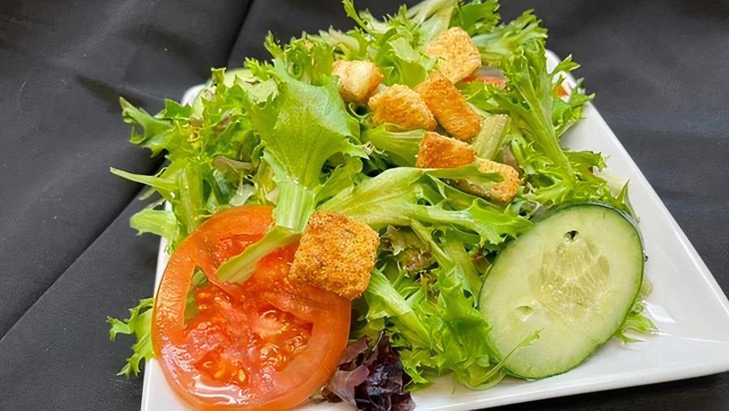 Side Salad · A mound of arcadian harvest mixed greens, cucumbers, sliced tomatoes, homestyle garlic croutons served with your choice of dressing