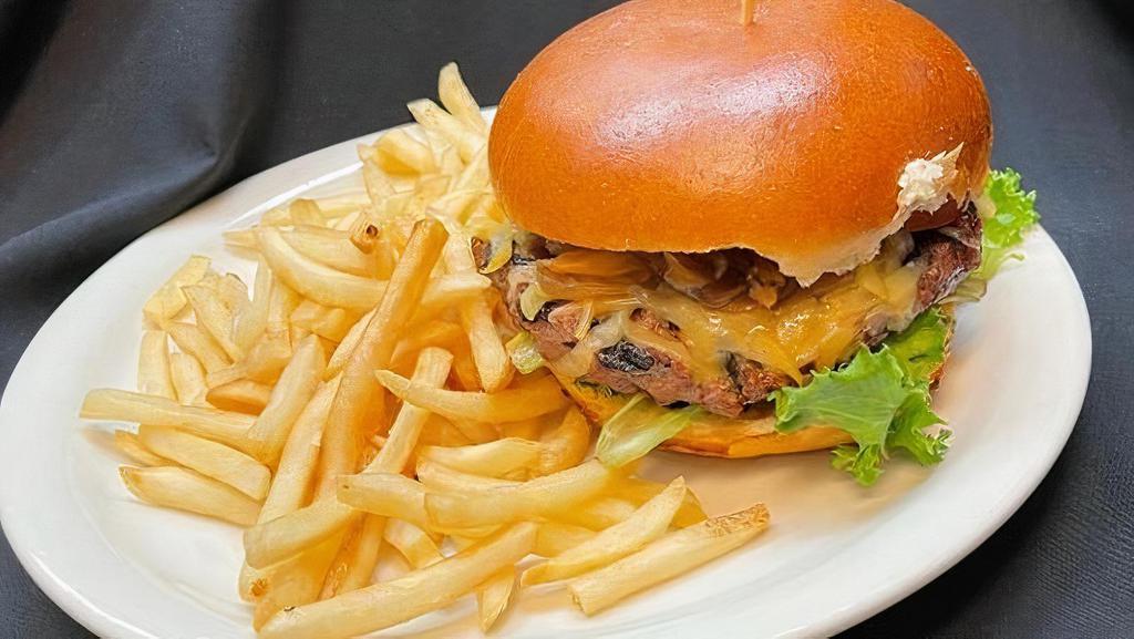Bison Burger · 8oz of our premium ground bison, topped with caramelized onions, shredded aged smoked gouda cheese, tomato, lettuce, paired with our house made Bourbon aioli.