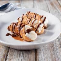 Cannoli · Three crunchy shells filled to order with a sweet, cannoli cream mixed with chocolate chips,...