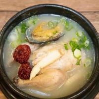Abalone Chicken Soup (전복삼계탕) · Ginseng chicken soup with abalone & chicken stuffed with sticky rice, jujubes, and garlic.