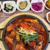 Braised Codfish (은대구조림) · Codfish with radish braised in seasoned soy sauce and gochujang red chili paste sauce.