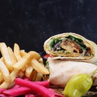 Chicken Wrap · spring mix lettuce, hummus, tomato, grilled onion, and house dressing.
{ dairy free }