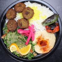 Falafel Plate · Tabbouleh  salad, Baba gannouj, safran rice, pita bread. 5 pice of falafel and tahini sauce.