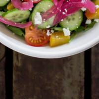 Baby Arugula · heirloom cherry tomatoes, roasted beets, pickled red onions, persian cucumber, watermelon ra...