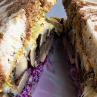 Mushroom Reuben · Roasted oyster mushrooms w swiss, mustard, russian & slaw on Rye