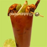 Ultimate Blackened Shrimp Bloody Mary · Blackened grilled shrimp, olives, lime, celery stick, and salt.