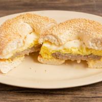 Sausage, Egg And Cheese · Sausage, egg, and cheese breakfast sandwich or burrito with cheddar cheese on on your choice...