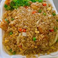 Shrimp Fried Rice · Stir Fried rice with eggs, onions, peas and carrots with Shrimp and topped with green onions.