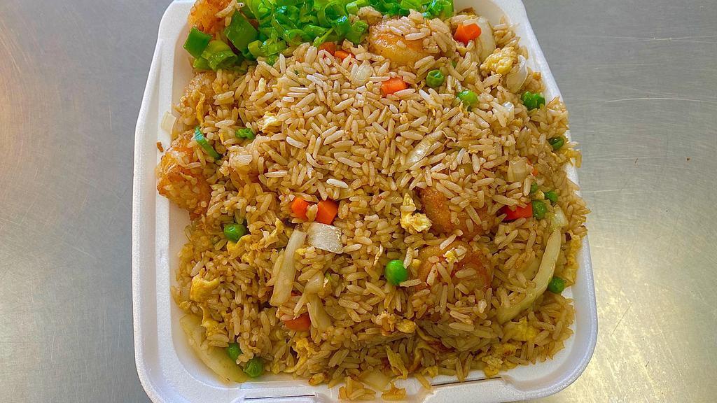 Shrimp Fried Rice · Stir Fried rice with eggs, onions, peas and carrots with Shrimp and topped with green onions.