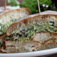Achiote-Marinated Chicken · Cabbage and radish slaw, roasted green chile mayonnaise; on ciabatta.