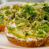 Avocado Toast · Avocado, cream cheese, zaatar, cilantro, and olive oil on sourdough bread.