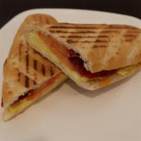 Egg Sandwich · 4 scrambled eggs, cheddar, beef bacon, tomato