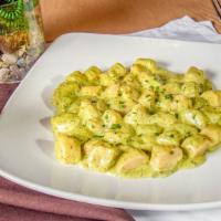 Gnocchi Alla Sorrentina · Signature dish, homemade potato dumplings, mozzarella, choice of tomato basil sauce or homem...