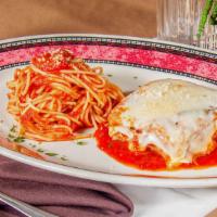 Pollo Parmigiana · Baked lightly breaded natural chicken breast, mozzarella, spaghetti in marinara sauce.