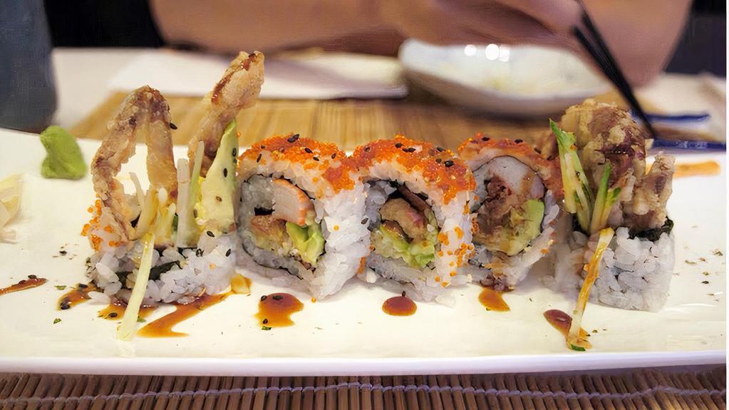 Spider Roll (6) · Soft shell crab, cucumber, avocado and lettuce, and with eel sauce, spicy mayo sauce.