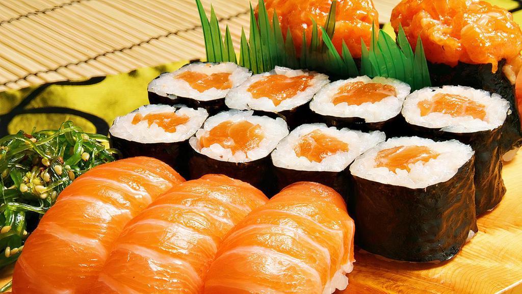 Salmon Lover · Eight salmon rolls and three salmon sushi, two spicy salmon sushi.