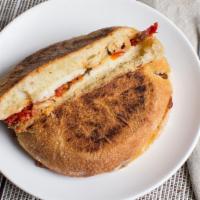 Asiago Vicenza · Ciabatta bread, garlic spread, Asiago grilled cheese, grilled eggplant and sun-dried tomato ...