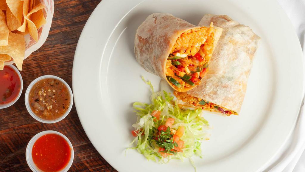 Burritos · Soft flour tortillas, rolled and filled with choice juicy beef, tender chicken or refrito beans and served with guacamole.