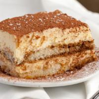 Tiramisu · Lady fingers lightly soaked in espresso coffee, layered with mascarpone cream and bitterswee...