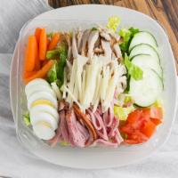 Julienne Salad · Crisp lettuce topped with ham, American cheese, turkey, hard boiled egg, tomato, olives and ...