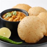 Pani Puri · Crisp wheat and lentil puffed nuggets with veggie filling and masala dipping sauce.