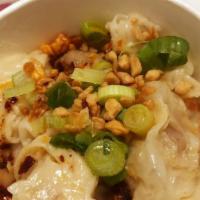 Pan Fried Dumplings · Ground pork, cabbage, bok choy, side of soy vinegar & chili oil.
