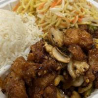 General Tso’S Pork Chop · Crispy pork chop wok fried with mushrooms, onions in sweet, chili pepper, garlic sauce.