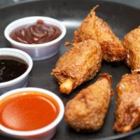 Drumsticks (5Pc) · Deep fried seitan chicken. choose of sauce: buffalo, mango habanero, jerk, korean BBQ, golde...
