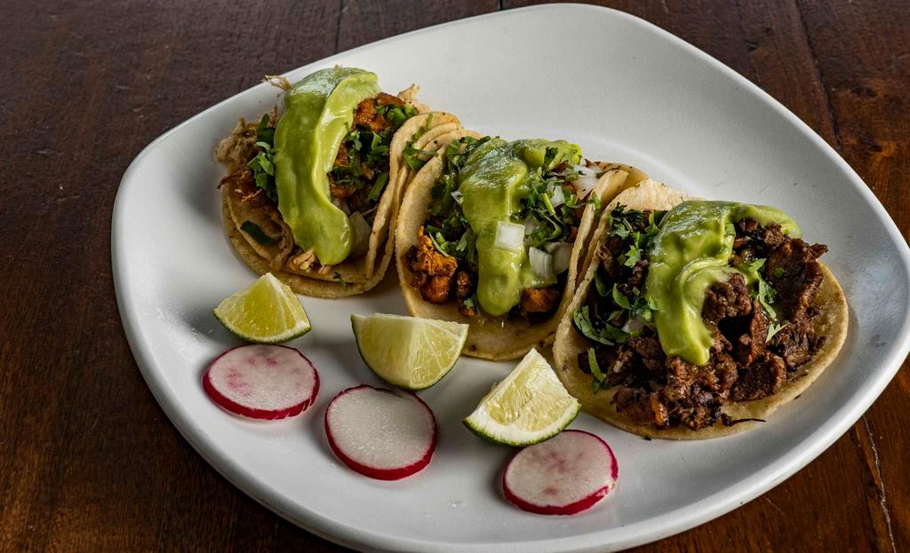 Chando'S Tacos (3) · Three per order. Enjoy your choice of chando's signature meat selection topped with fresh cilantro, delicious diced onions, creamy guacamole, and tangy salsa.