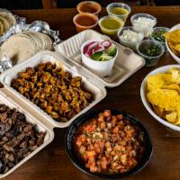 Family Style Taco Kit (2 Lb) · Feeds six people. Your choice of two pound of chando's signature meat, tortillas, chips and ...