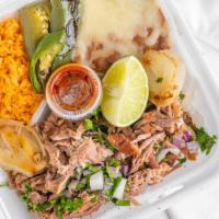 Carnitas Plate · Includes Spanish rice	
Refried beans and 4 fresh corn tortillas