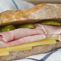 Classic Ham & Cheese Sandwich · Ham and cheese served with lettuce and mayo in a crispy French baguette.