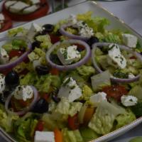 Greek Salad · Feta cheese, baby mixed greens, cherry tomatoes, cool cucumber, Kalamata olives, red onion.