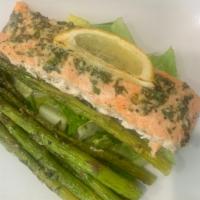 Salmon Filet · Fresh filet of salmon marinated and grilled. Served with rice and asparagus or broccoli.