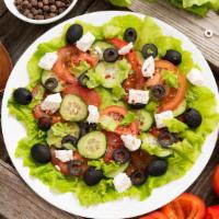 Greek  · Romaine hearts, tomatoes, cucumbers, bell pepper, carrots, Kalamata olives and feta cheese.