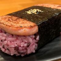 Spam Musubi · baked sliced spam with purple rice and dried seaweed and eel sauce.