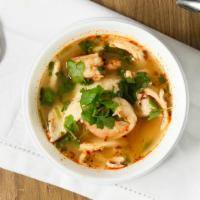 Tom Yum Soup · The most popular spicy and sour soup cooked with lemongrass, lime juice, galangal, mushrooms...
