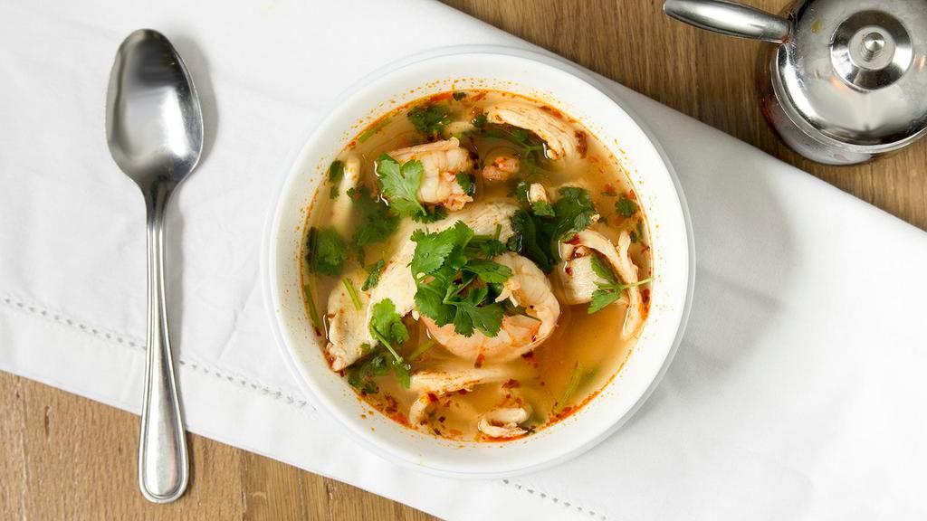 Tom Yum Soup · The most popular spicy and sour soup cooked with lemongrass, lime juice, galangal, mushrooms, and cilantro.