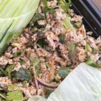 Larb · Spicy chopped chicken or tofu salad with lime juices, mints, cilantro, red onions, Thai chil...