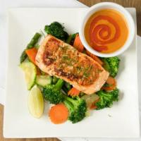Grilled Salmon · Grilled fresh salmon topped with house special curry sauce on a bed of steamed mixed veggies.