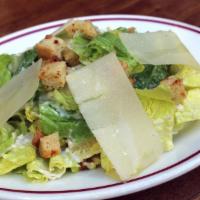 Caesar Salad · Romaine Lettuce, Croutons, Parmigiano, Caesar dressing.