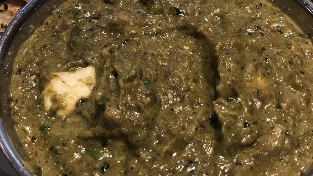 Saag Paneer · The comfort food of Punjab, slow-cooked spinach and mustard greens with fresh ginger and garlic and paneer.