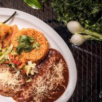 El Grande Platter · Choose 2 Items: Chili Relleno, Tamale, Enchilada or Grande Taco. Served with Rice and choice...