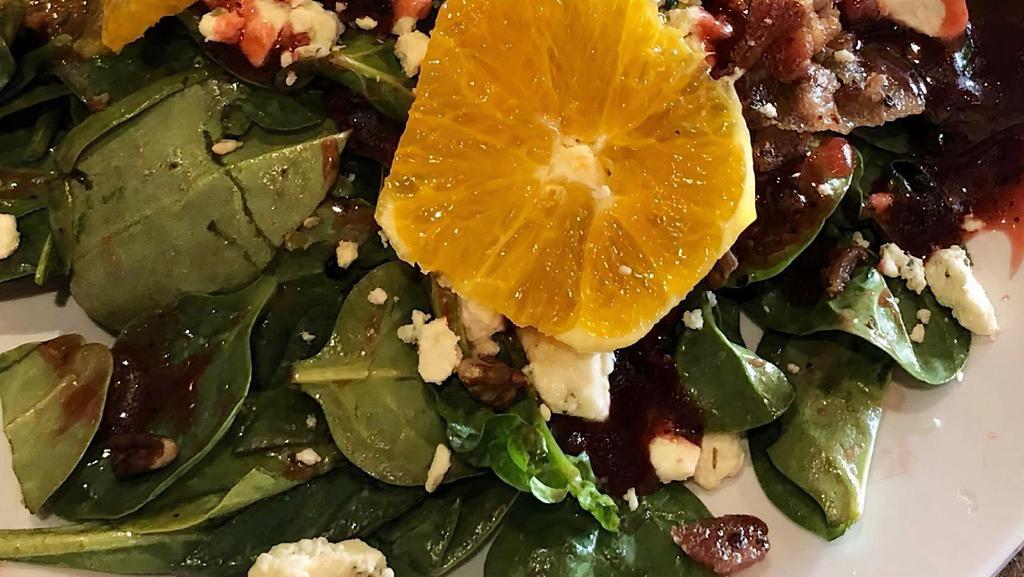 Baby Spinach Salad · Toasted pecans, mandarin orange wedges, roasted bacon and queso panela tossed with raspberry-mustard vinaigrette.