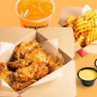 15 Classic Wings For 2 · 15 bone - in wings, 2 flavors, 2 sides (waffle fries, tots or veggie sticks), 2 dips, 2 soft...