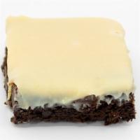 Get Fudged Up-Brownie With White Chocolate Fudge · Gooey, buttery, fudgy, brownie topped with white chocolate fudge